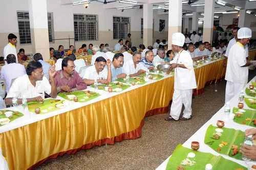 Guests seated for a traditional wedding meal